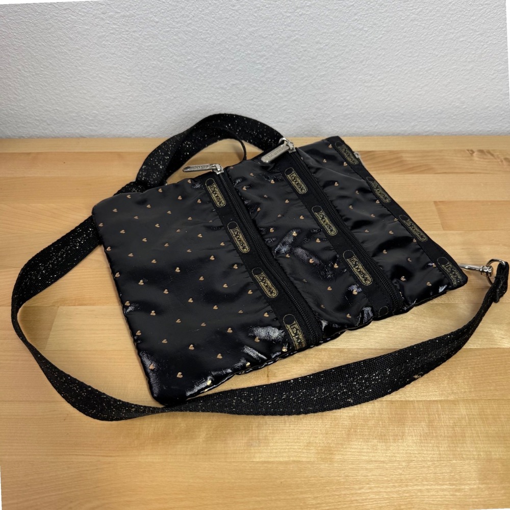 LeSportsac Kylie Crossbody Bag Black Gold Heart Print Triple Zip Glitter Strap